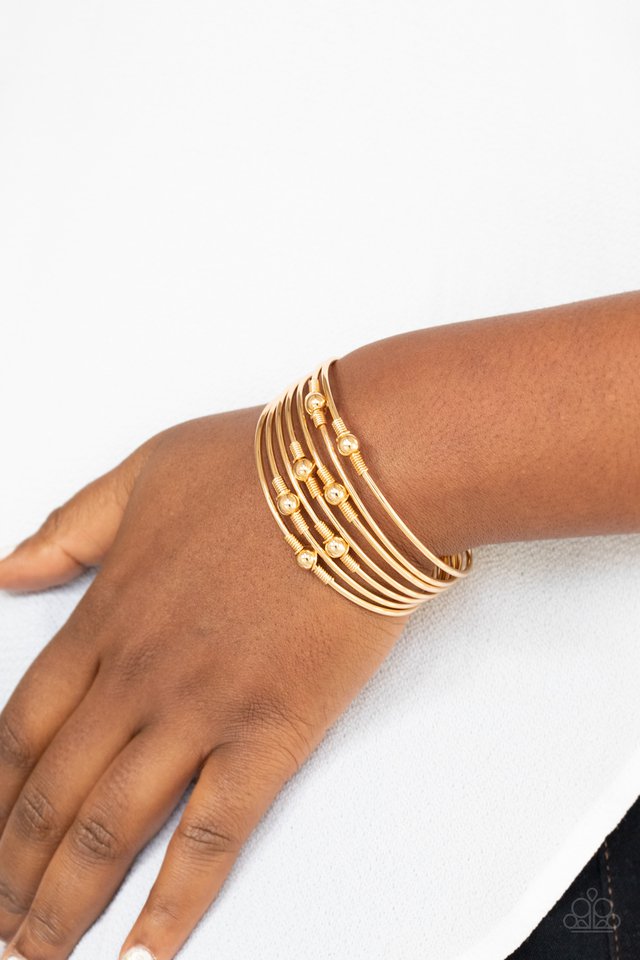 Industrial Intricacies Gold bracelet